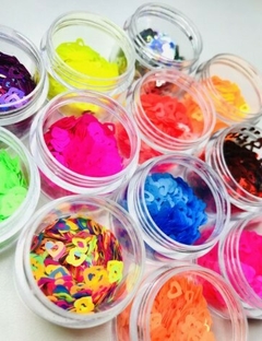 Caixa Com 12 Potes Grandes de Glitter na internet