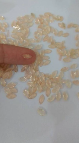 Pacote com aprox. 10 Navetes Gliter