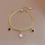 SET DE COLLAR Y PULSERA ESTELAR - Pearl & Ruby