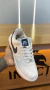 Tênis Nike Air Force 1 Branco com detalhes azul na internet