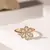 Imagem do Anel - flores cravejadas de zircônias no banho de ouro 18k