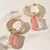 Brinco - pedra fusion quartzo rosa com argola cravejada em zircônias no banho de ouro 18k - comprar online