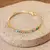 Pulseira - cristais citrino, peridoto e turmalina rosa riviera no banho de ouro 18k - 16cm