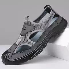 Sandálias de malha respirável para homens, sandálias de praia antiderrapantes, sapatos ocos ao ar livre, calçados flats, verão, novo - comprar online