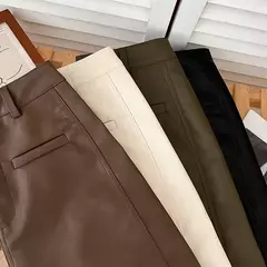 Saia Bodycon de couro PU feminina, botões vintage, bolso com zíper, versátil, cintura alta, fina, curta, sólida, linha A, verão, novo - Wolf Magazine