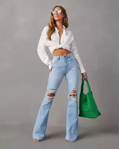 Calça jeans flare feminina, jeans de streetwear, ajuste solto, cintura alta, bolsos, buracos, comprimento do tornozelo, monocromático, mosca com zíper, primavera, 2021