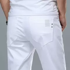 SHAN BAO-Jeans slim branco masculino, roupa confortável de algodão, elástico, casual, leve, de negócios, primavera, verão, 2022 - comprar online