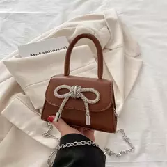 Imagem do Mini bolsa de ombro monocromática para mulheres, design de arco, couro PU, aba, bolsas crossbody, bolsa de corrente, bolsas femininas, moda, 2024