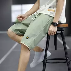2023 verão calções masculinos esportes de cinco pontos calças soltas casual praia calças cor sólida tendência exterior wear tamanho grande shorts 8xl - comprar online