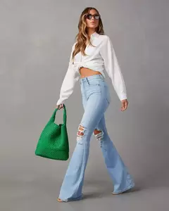 Calça jeans flare feminina, jeans de streetwear, ajuste solto, cintura alta, bolsos, buracos, comprimento do tornozelo, monocromático, mosca com zíper, primavera, 2021 na internet