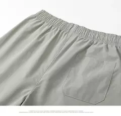 Imagem do 2023 verão calções masculinos esportes de cinco pontos calças soltas casual praia calças cor sólida tendência exterior wear tamanho grande shorts 8xl