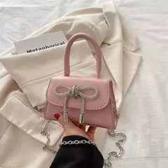 Mini bolsa de ombro monocromática para mulheres, design de arco, couro PU, aba, bolsas crossbody, bolsa de corrente, bolsas femininas, moda, 2024 na internet