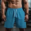 UETEEY-Calças curtas finas leves para homens, shorts masculinos com cordão, desgaste de ginástica, corrida, agachamento, fitness, secagem rápida, quente
