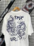 Camiseta Oversized Trip Side Tiger x Dragon Branca na internet
