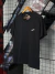 Camiseta Hocks Hubric Preta na internet