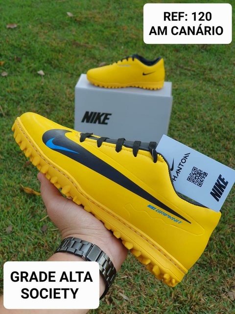 chuteira - Nike amarelo
