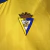 Kit Infantil Cadiz I Macron 23/24 - Amarelo com detalhes em azul - loja online