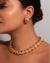 Conjunto Colar e Brinco detalhes cravejados e lisos em Banho de Ouro 18K - comprar online