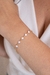 Pulseira trevo flor esmaltada banho de ouro 18k