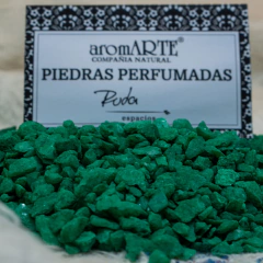 Piedras perfumadas de color verde, aroma RUDA presentadas en un envase con la etiqueta de aromARTE.