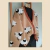 CARDIGAN DOLLY BEIGE Y CHOCOLATE en internet