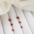 Trio de Brincos Zircônia Vermelho Rubi Banhada a Ouro 18K