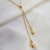 Colar Gravatinha Regulável com Pingente de Bolinha Banhada a Ouro 18K - comprar online