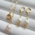 Conjunto de Brinco e Colar com Fecho Boia e Pingente de Pérola Barroca Banhado a Ouro 18K