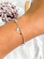 Pulseira bolinhas com crucifixos pendurados - comprar online