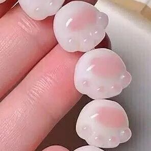 Pulsera elástica con cuencas de raíz de Bodhi en forma de huellitas.