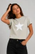 REMERA BABY TEE MANGA CORTA ALGODON CON LYCRA KENDAL ESTAMPA ESTRELLA - Ropa para Adolescentes, Jeans Baggy y Buzos Oversize | Not Alone
