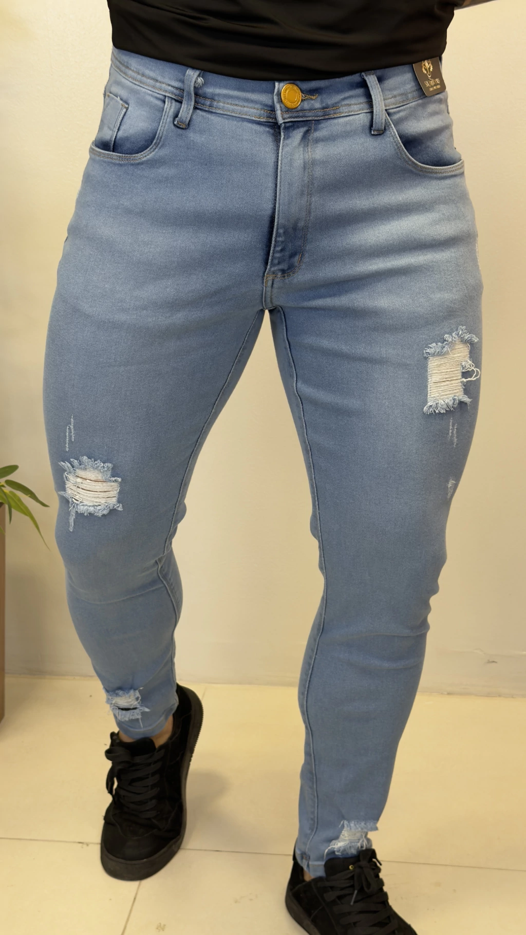 Calça Jogador - Light Jeans Rasgada