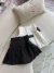 Shorts saia babado alfaiataria