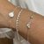 PULSEIRA COM 4 BOLINHAS E PONTO DE LUZ - comprar online