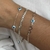 PULSEIRA COM INFINITOS E OLHO GREGO - comprar online