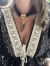 Choker em veludo preto com pingente de dente. (40 cm mais alongador)