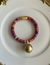 Pulseira de fio indiano rosa com dourado e bola dourada, fecho de imã.