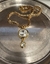 Colar em dourado, 38 cm mais alongador, com pingente de cristal em dourado. - comprar online