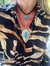 Choker em couro preto com alongador e pedra azul. (mistura de banhos) na internet