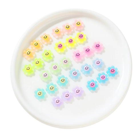 Charms Flor Carita Feliz – Set x10 piezas | Brillan en la oscuridad - comprar online