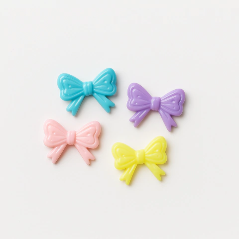 Charms moñito pastel x20