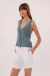 Musculosa Zucca tejida en internet