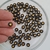 Cuenta Pastilla Negra Corazon Dorado - comprar online