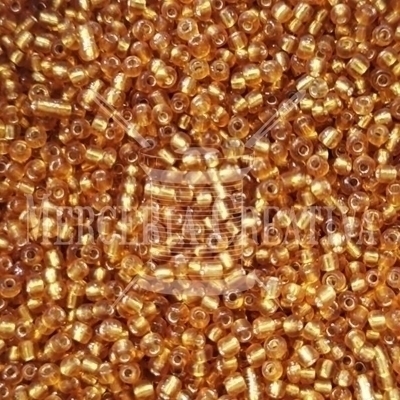 Mostacilla de Vidrio 2mm x 10 grs. - Dorado Transparente (206)