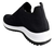 Zapatillas elastizadas Wake de color negro con suela blanca, vista lateral trasera.