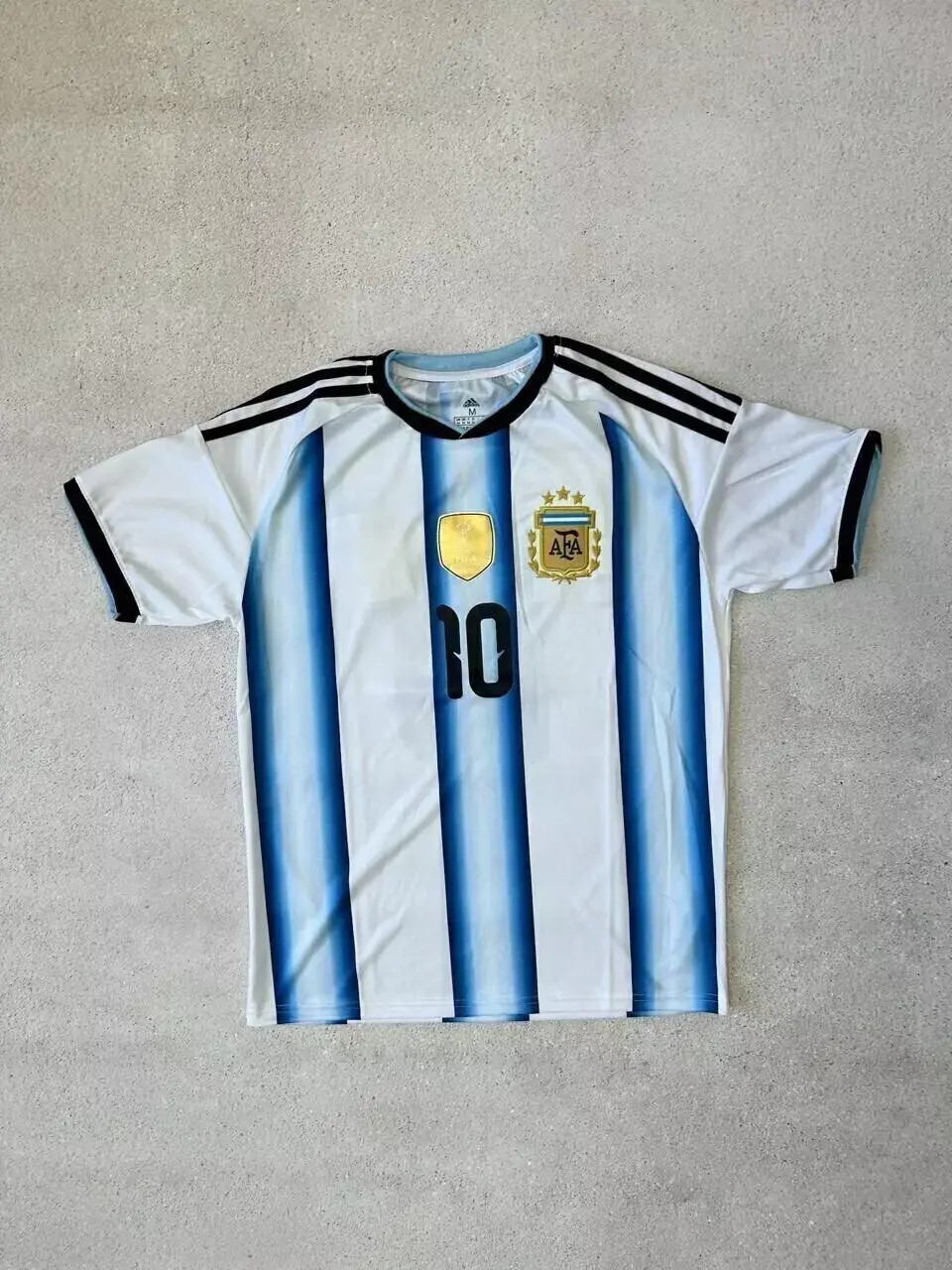 CAMISETA TITULAR AFA MUNDIAL 2026