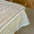 MANTEL ECOCUERO ESTAMPAS RAYAS IRREGULARES CHAMPAGNE (MRAYASCH)