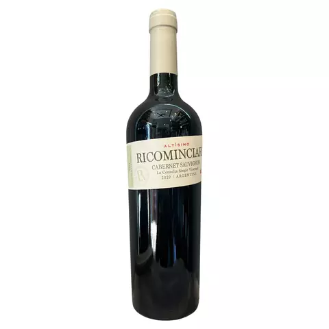 Botella de vino tinto Ricominciare Altísimo Cabernet Sauvignon de Argentina con etiqueta blanca y tapa color crema