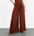 Calça Pantalona Com Pregas Frontais na internet