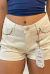 Shorts Consciência Jeans Feminino Mom com Detalhe de Aplicação Ana Castela Off White